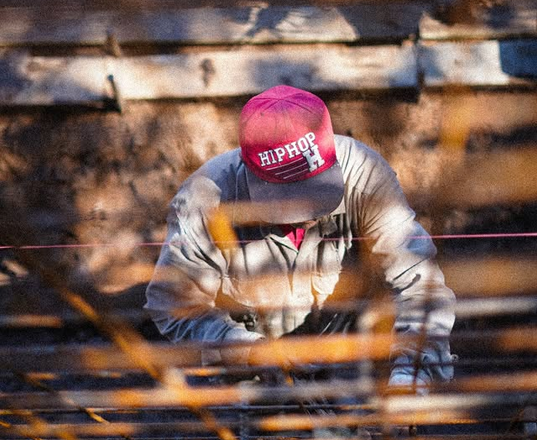 Construction worker with red hat